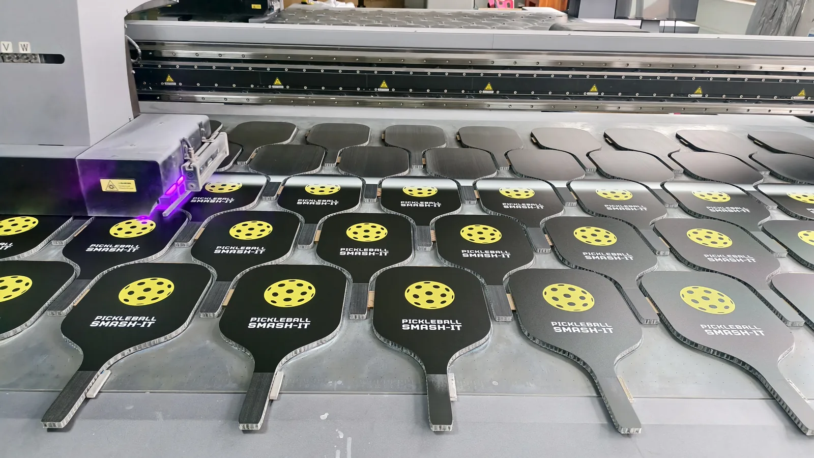 UV printing setup for custom pickleball paddle face graphics