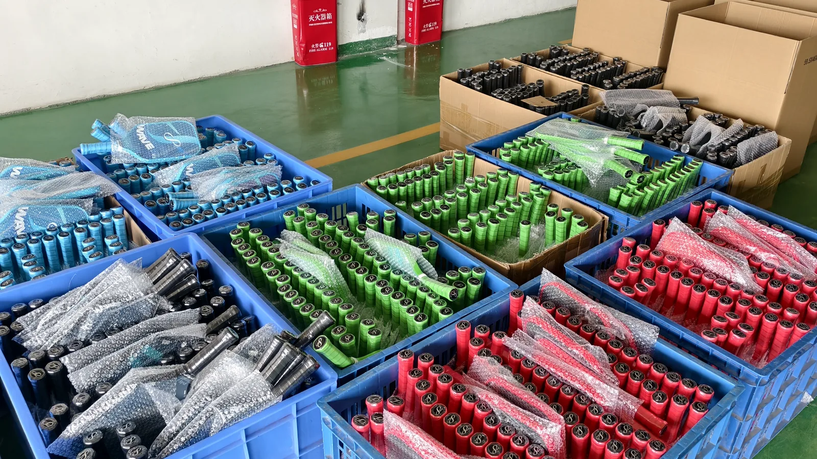 Pickleball paddles being sorted and packed at the Plekin Sports factory