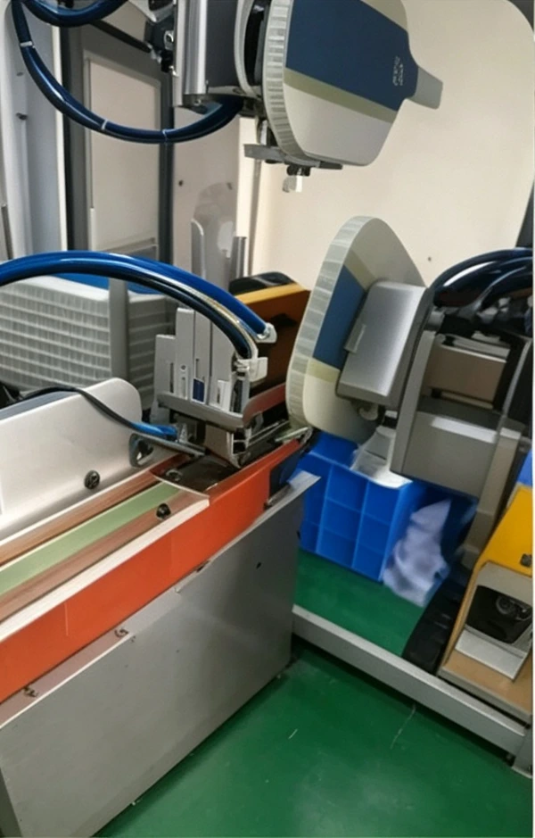 Precise adhesive application along paddle perimeter for strong edge guard bonding and impact protection