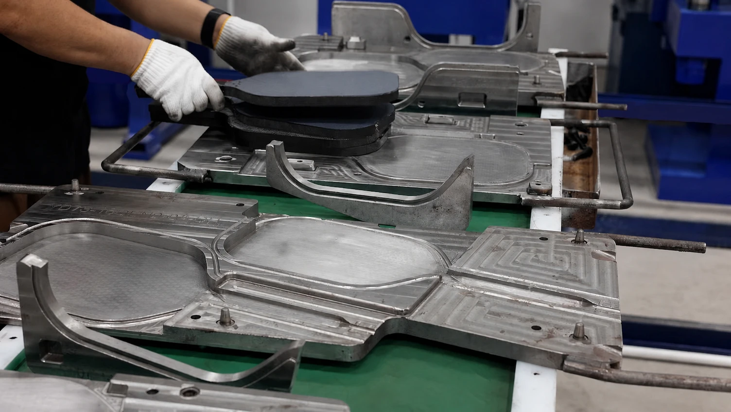 Demolding unibody thermoformed carbon fiber pickleball paddle frame after high-temperature curing process