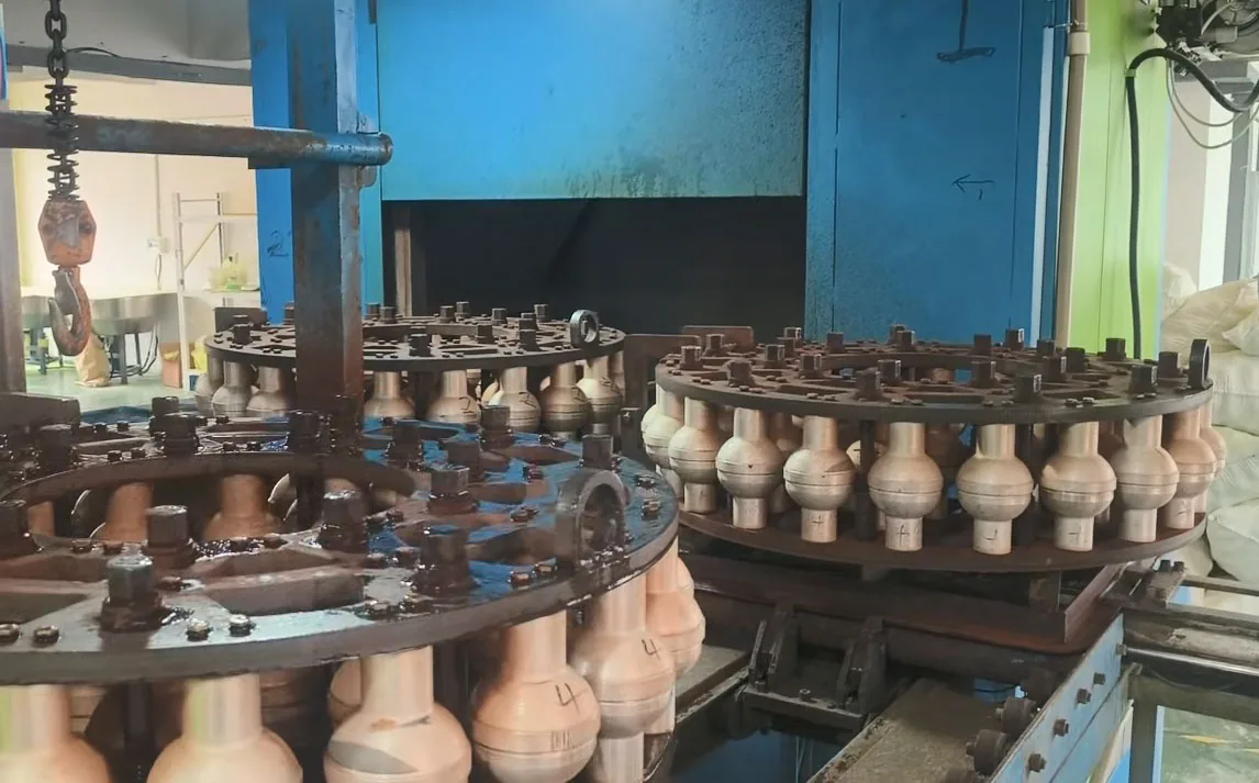 Rotational molding machinery operating for seamless 40-hole outdoor pickleball manufacturing at Peijin Sports
